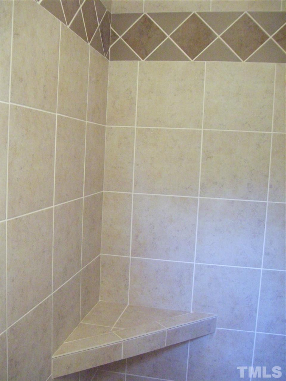 410 Jones Franklin Road Raleigh, NC 27606 - Photo 11 of 17 a bathroom with a shower