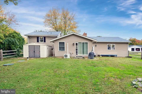 a house view with a garden space