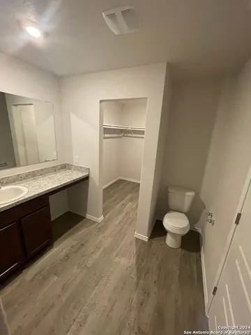 a bathroom with a sink and a toilet