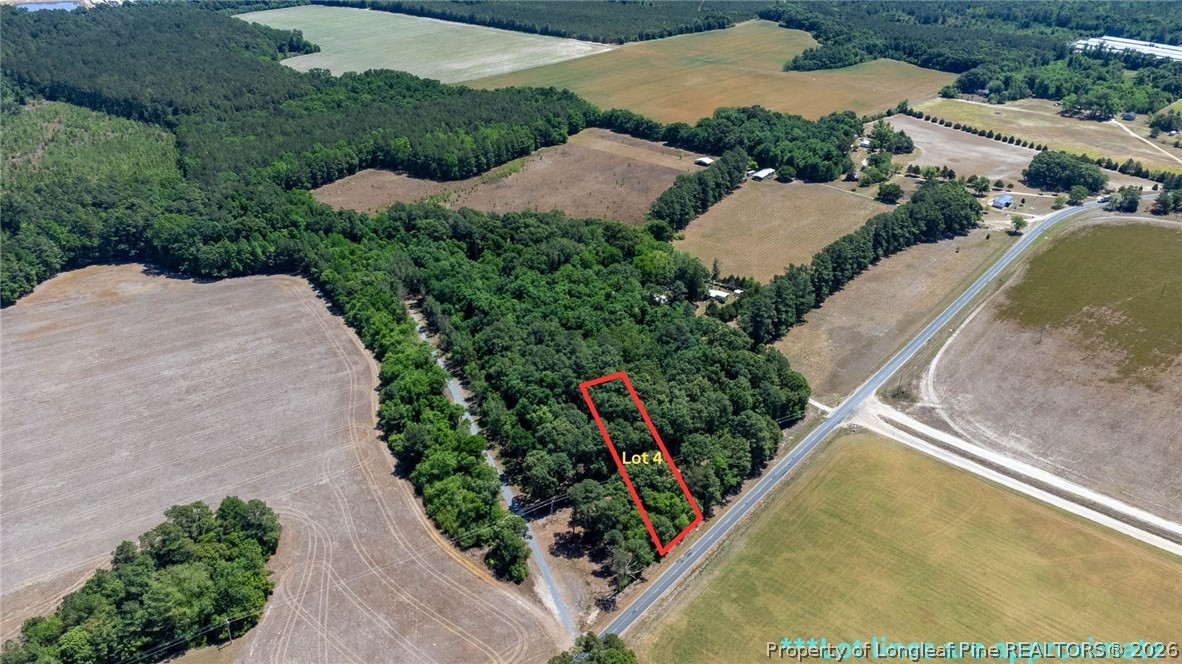 1780 Gainey Road Raeford, NC 28376 - Photo 1 of 12 an aerial view of a house