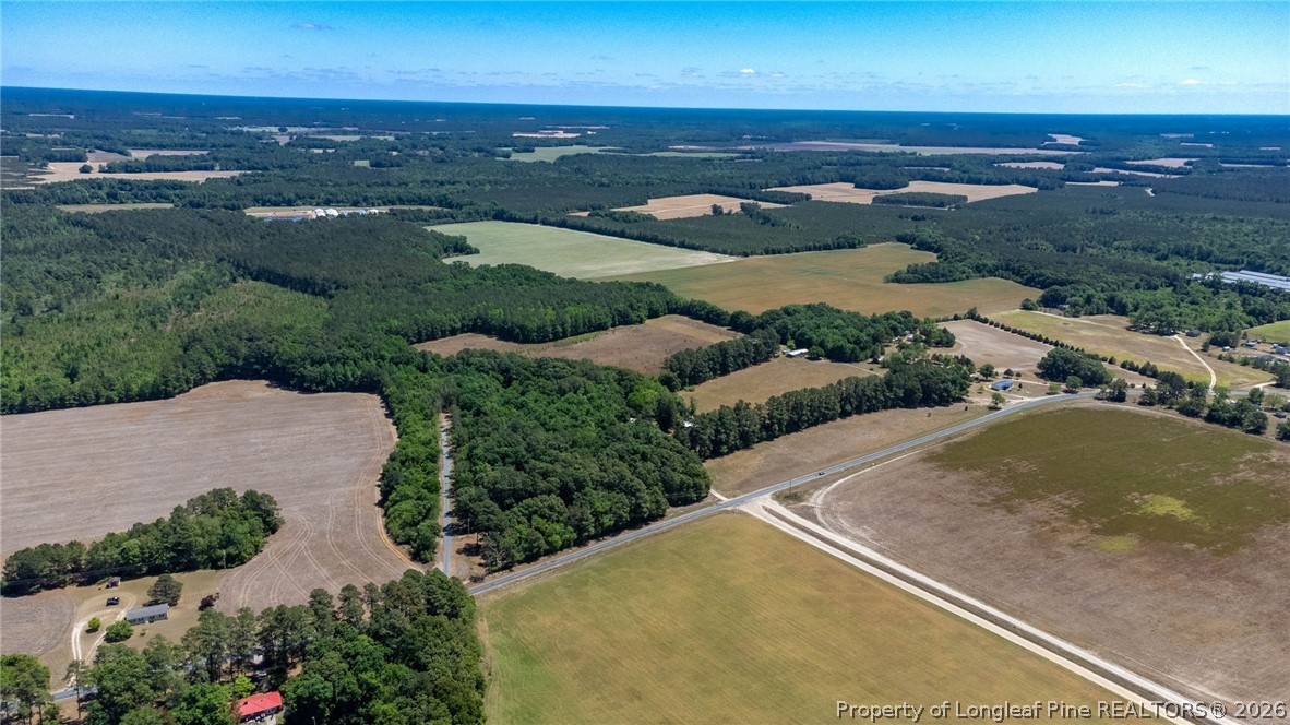 1780 Gainey Road Raeford, NC 28376 - Photo 10 of 12 an aerial view of residential houses with outdoor space and river