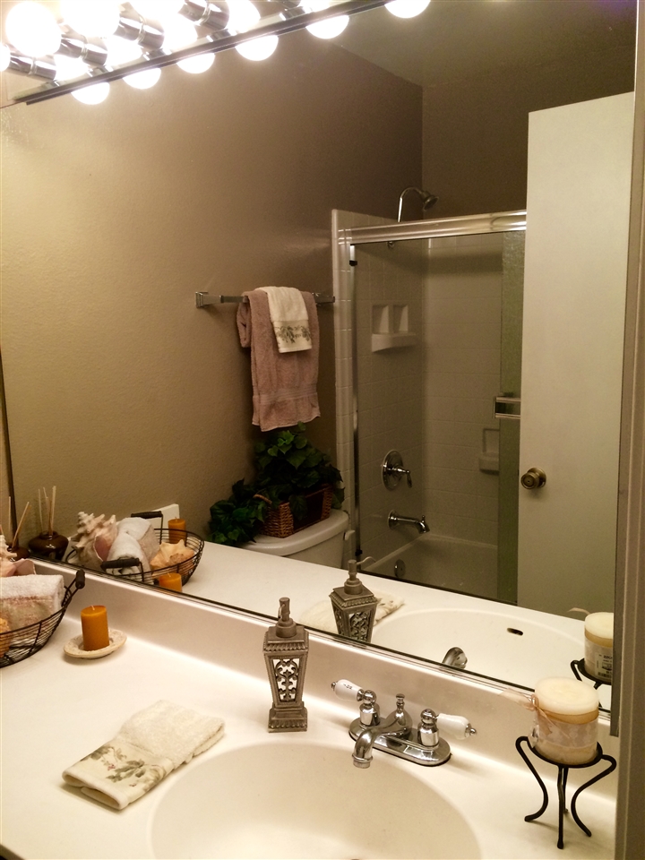 854 South Rancho Santa Fe Road San Marcos, CA 92078 - Photo 19 of 25 Both master baths have a shower over tub. Both tubs have been replaced.
