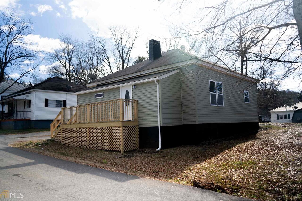 72 2nd Street Calhoun, GA 30701 - Photo 1 of 1 a view of a house with a back yard