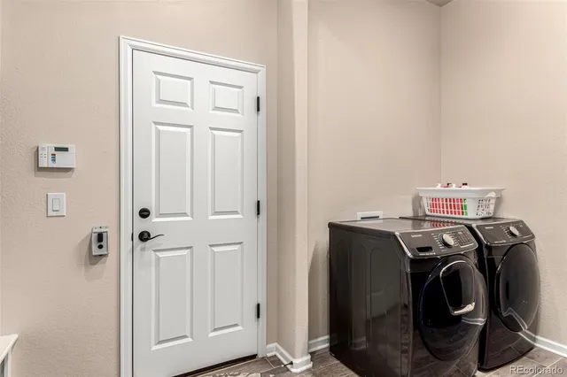a view of livingroom with furniture and a rug
