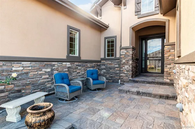 a view of an outdoor space with lounge chair