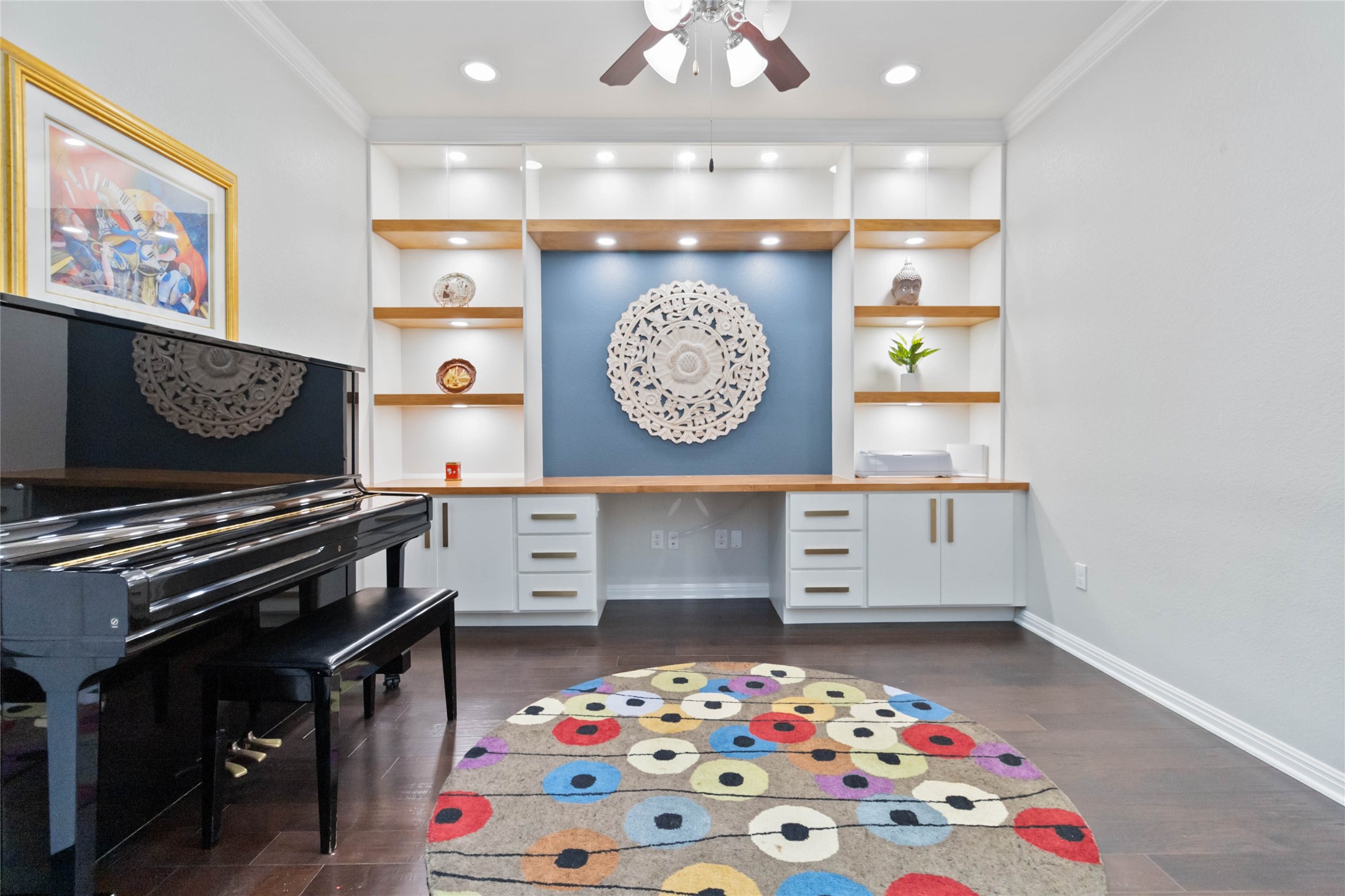 8032 Via Verde Drive Austin, TX 78739 - Photo 11 of 37 a room with furniture and paintings on the wall