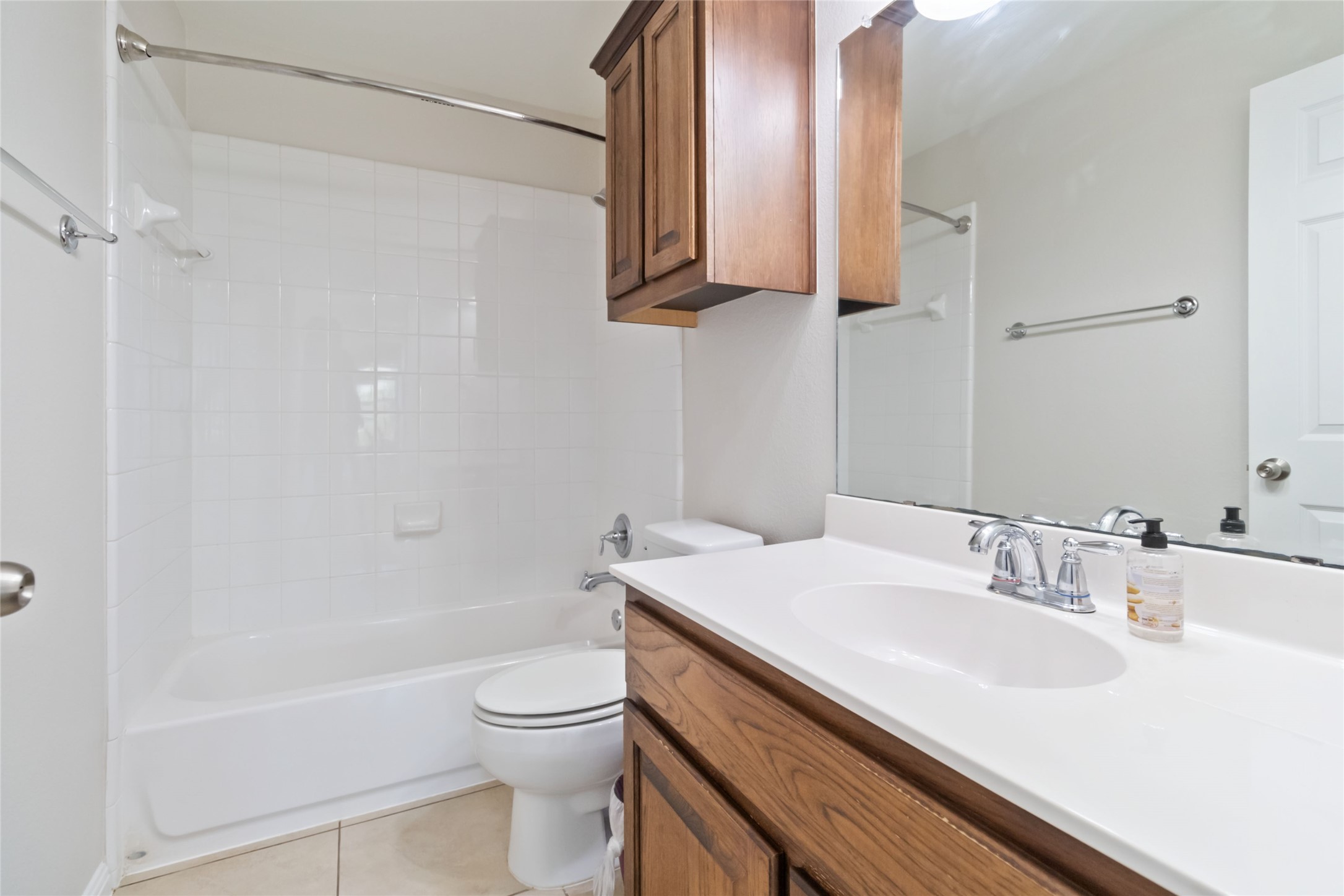 8032 Via Verde Drive Austin, TX 78739 - Photo 23 of 37 a bathroom with a sink a toilet and a bathtub
