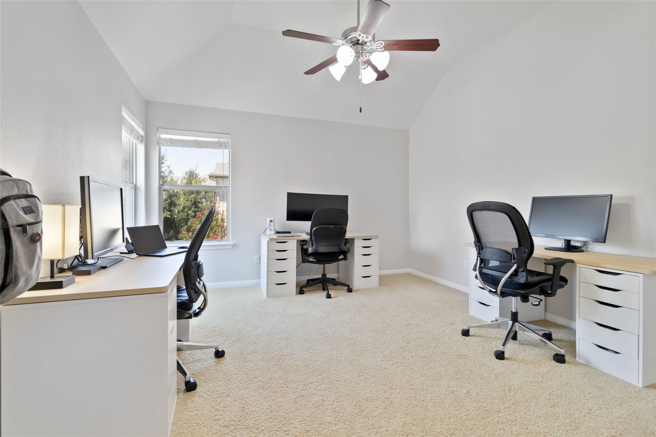 8032 Via Verde Drive Austin, TX 78739 - Photo 26 of 37 a view of a workspace with furniture and a window