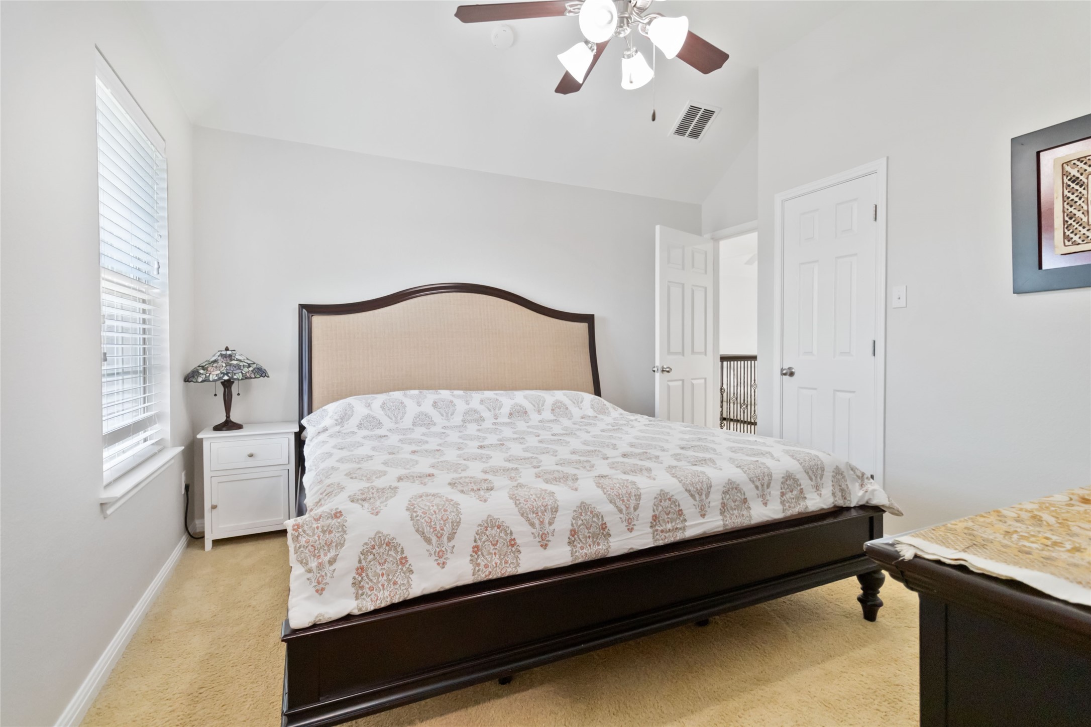 8032 Via Verde Drive Austin, TX 78739 - Photo 32 of 37 a bedroom with a bed and window