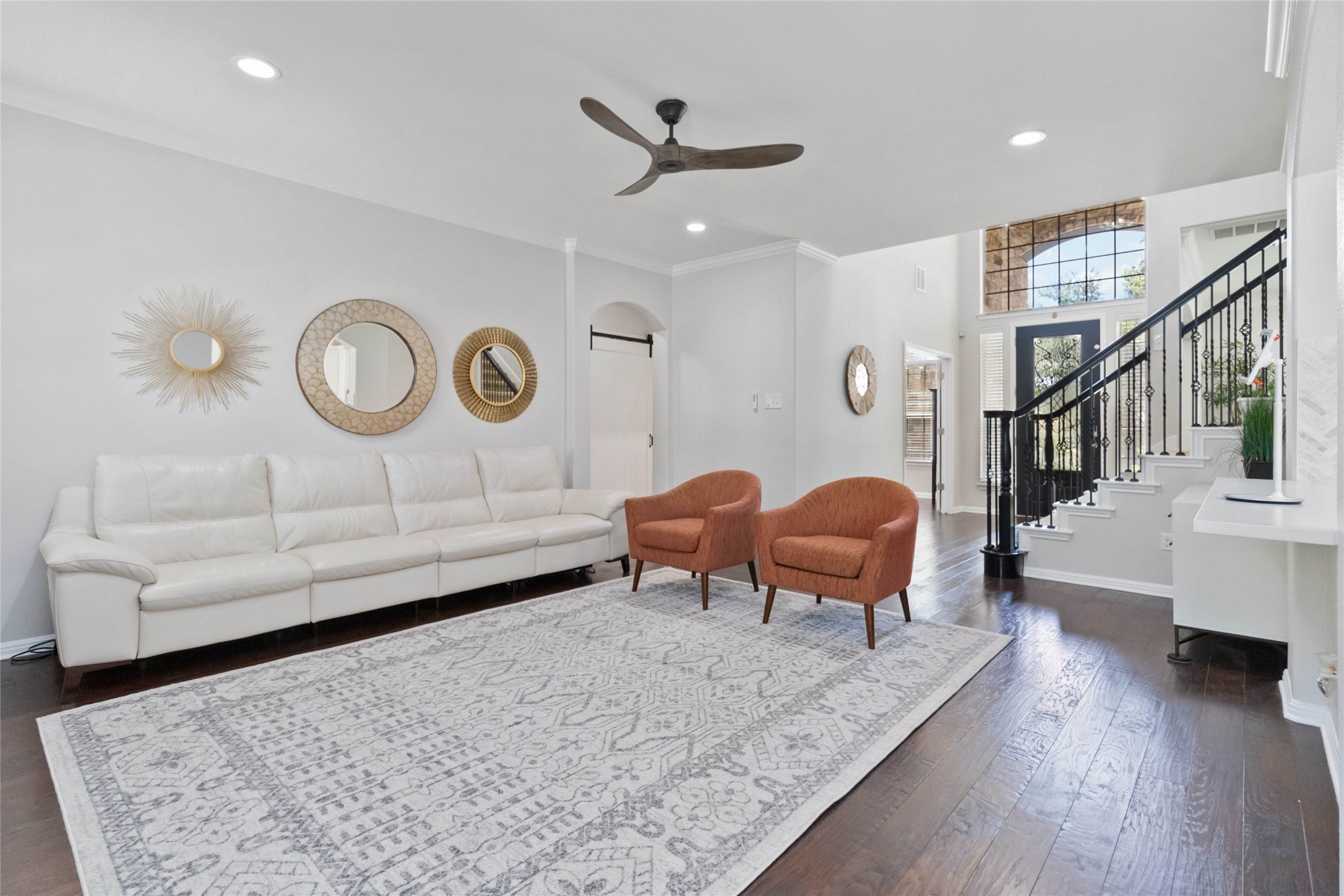 8032 Via Verde Drive Austin, TX 78739 - Photo 9 of 37 a living room with furniture and a table