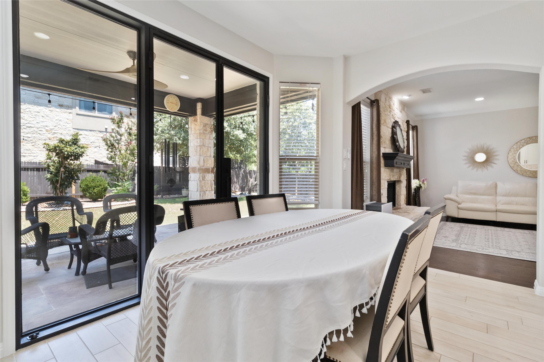 8032 Via Verde Drive Austin, TX 78739 - Photo 10 of 37 a dining room with a large window and table