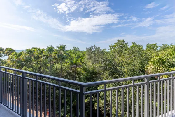 a balcony with an outdoor space