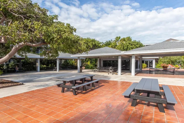 front view of building with a garden