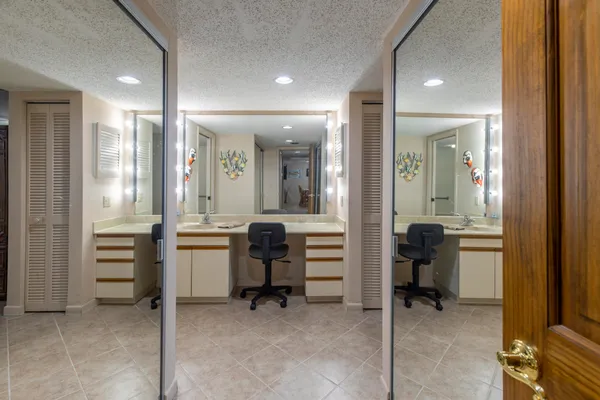 a bedroom with bed or furniture and a chandelier