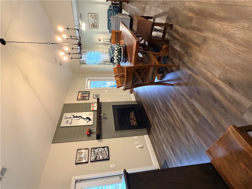 203 Legacy Lane Liberty, SC 29657 - Photo 14 of 47 This inviting interior features elegant flooring and an attractive fireplace, perfect for gatherings.