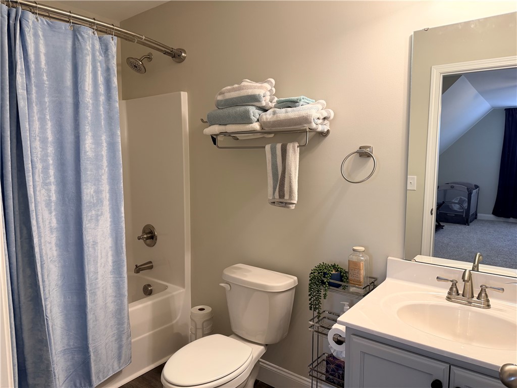 203 Legacy Lane Liberty, SC 29657 - Photo 34 of 47 This bathroom features a shower, toilet, and vanity, offering functionality and style.