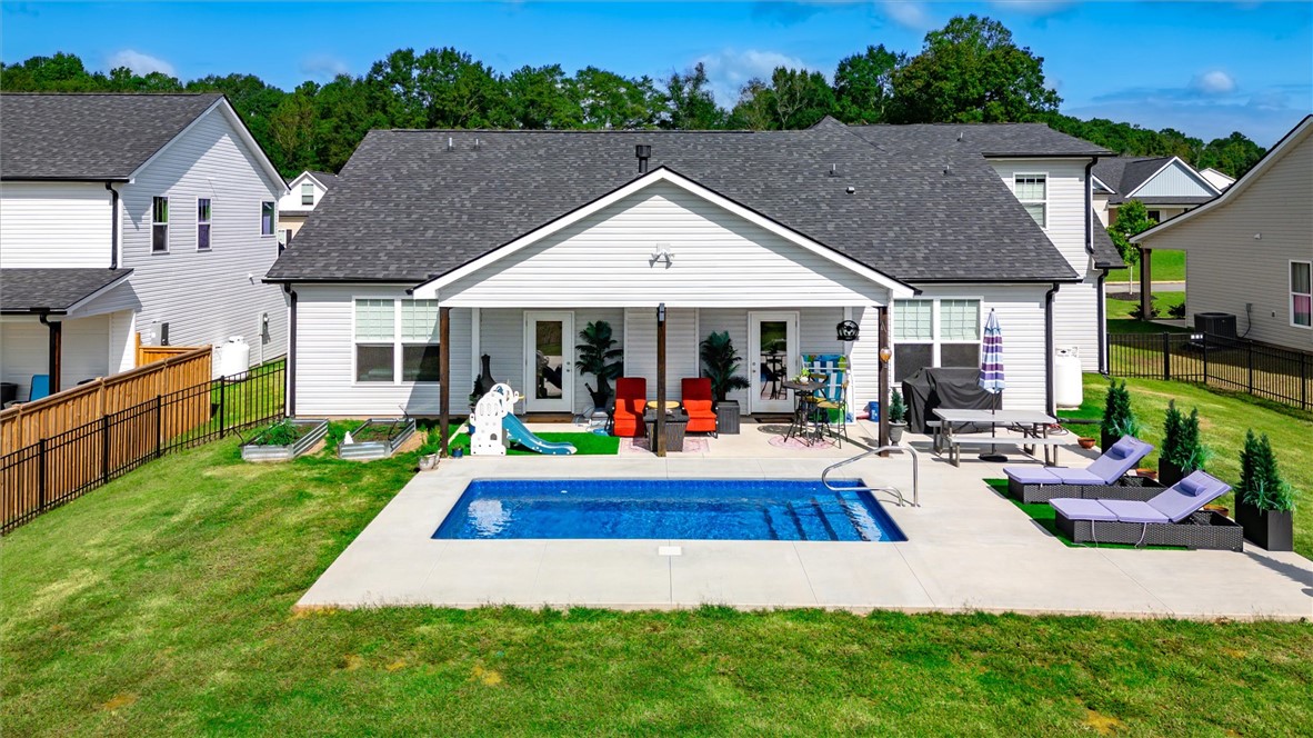 203 Legacy Lane Liberty, SC 29657 - Photo 43 of 47 Enjoy outdoor living with a spacious yard and inviting pool perfect for relaxation and entertainment.