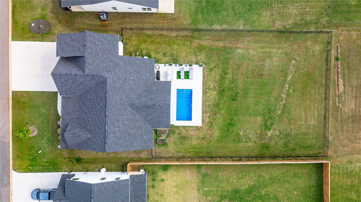 203 Legacy Lane Liberty, SC 29657 - Photo 45 of 47 An aerial view showcases a residential property featuring a refreshing pool and ample yard space.