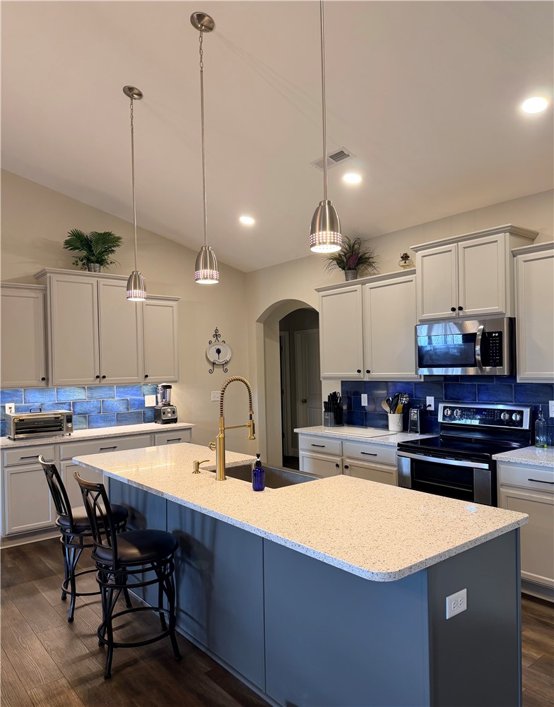 203 Legacy Lane Liberty, SC 29657 - Photo 6 of 47 This kitchen showcases modern design with a central island and contemporary fixtures.