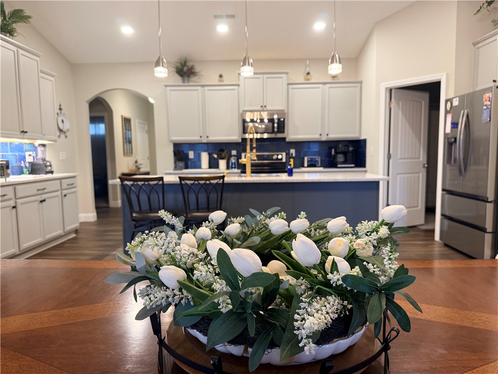 203 Legacy Lane Liberty, SC 29657 - Photo 7 of 47 This spacious kitchen offers a large island with seating, ideal for gathering and culinary endeavors.