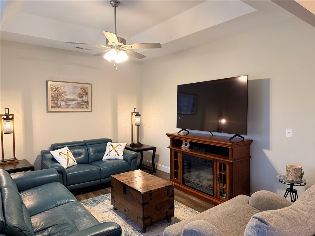203 Legacy Lane Liberty, SC 29657 - Photo 9 of 47 This inviting family room offers a warm ambiance for relaxation and gatherings.
