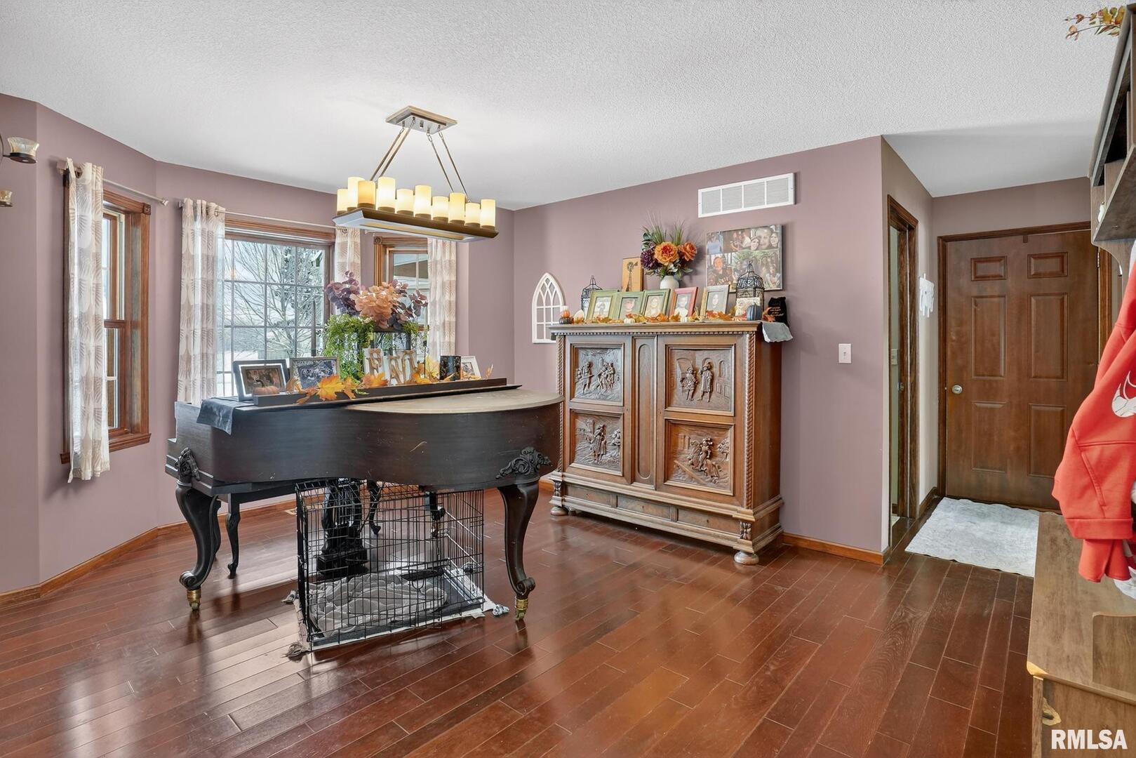 5759 Riverview Road Thomson, IL 61285 - Photo 11 of 49 a view of a dining room with furniture window and wooden floor