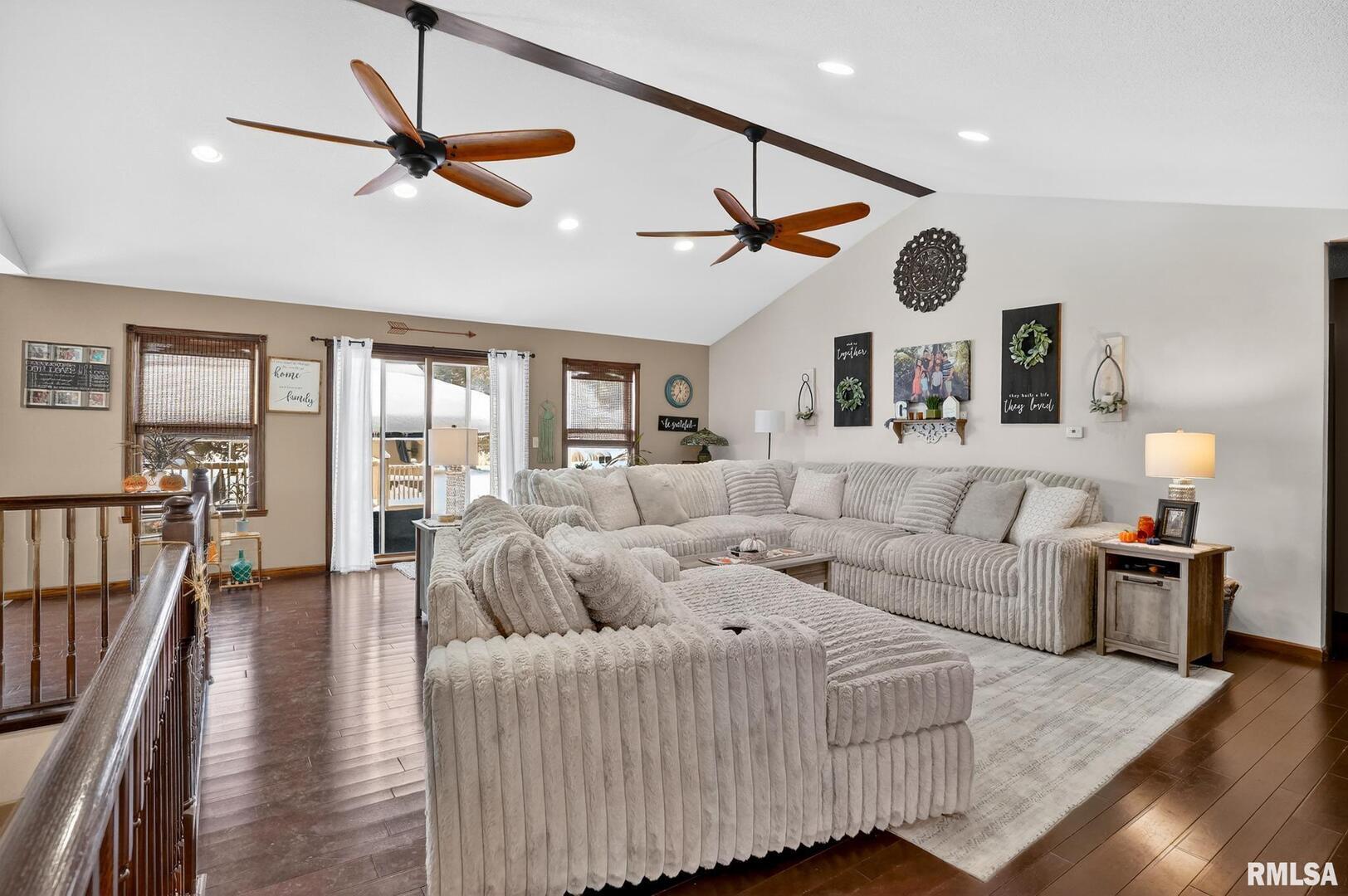 5759 Riverview Road Thomson, IL 61285 - Photo 12 of 49 a living room with furniture and a ceiling fan