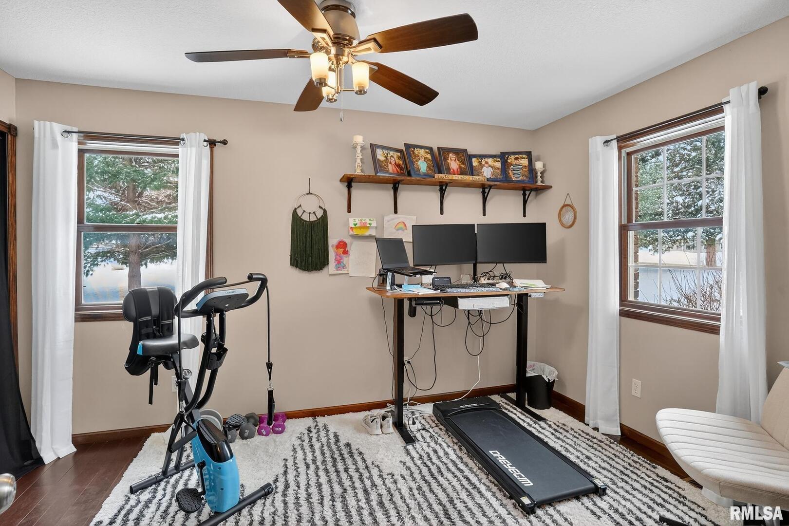 5759 Riverview Road Thomson, IL 61285 - Photo 38 of 49 a view of workspace with wooden floor entryway