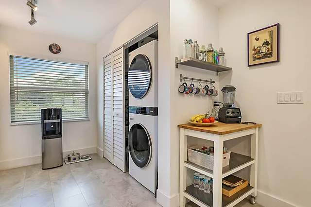 a utility room with dryer and washer