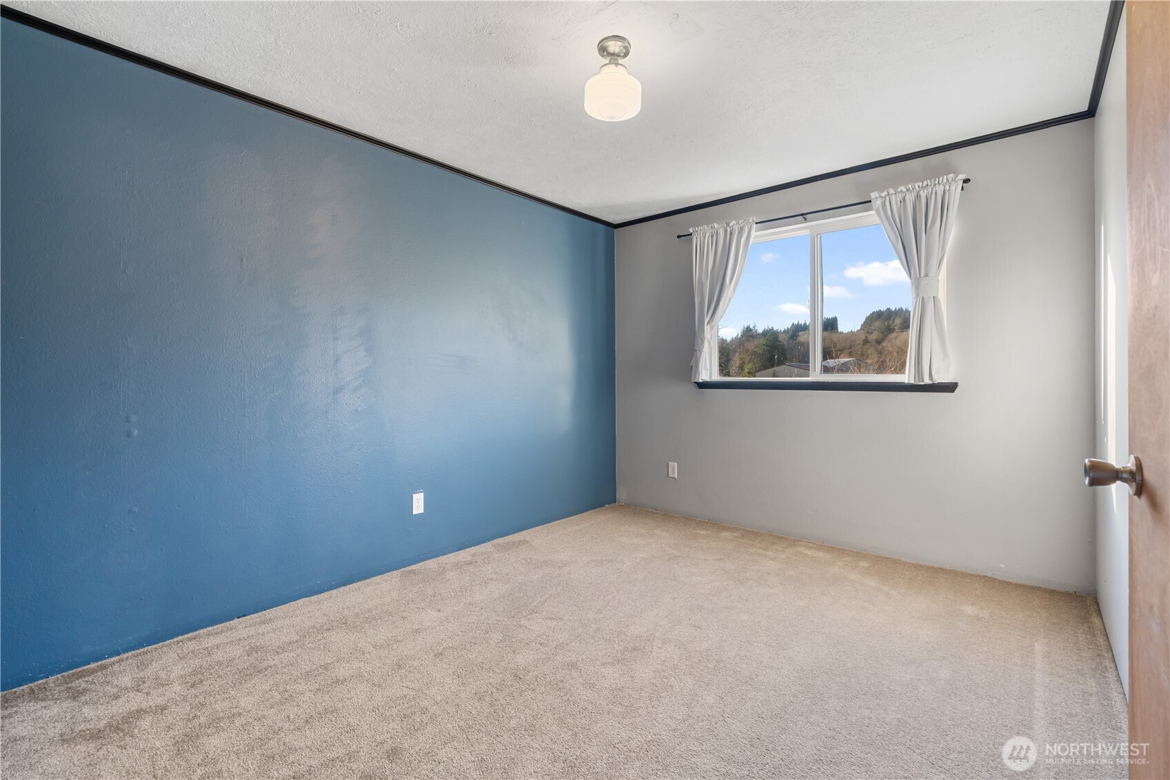 124 Highland Valley Road Morton, WA 98356 - Photo 14 of 36 a view of empty room with windows