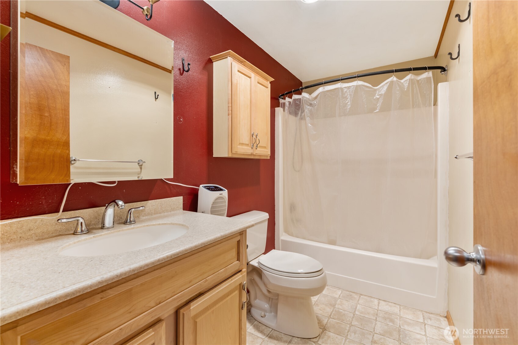 124 Highland Valley Road Morton, WA 98356 - Photo 16 of 36 a bathroom with a sink a toilet and shower