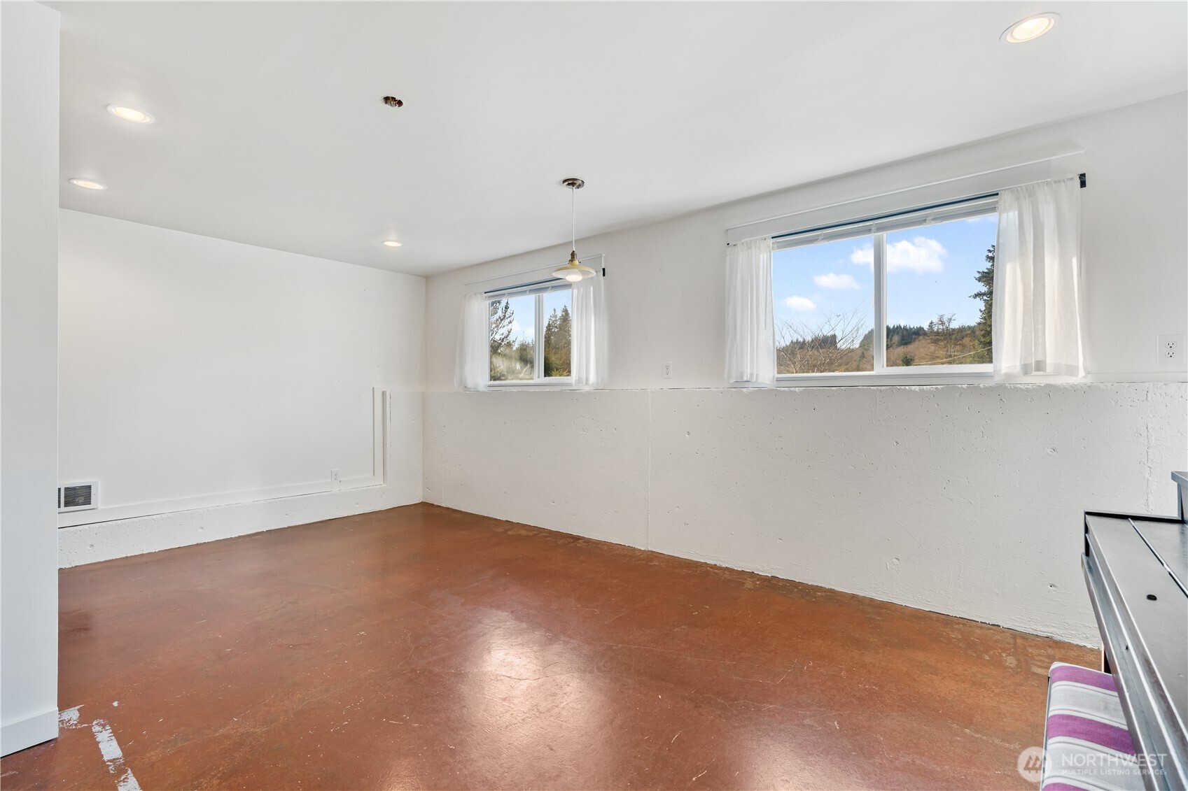 124 Highland Valley Road Morton, WA 98356 - Photo 18 of 36 a view of an empty room with a window