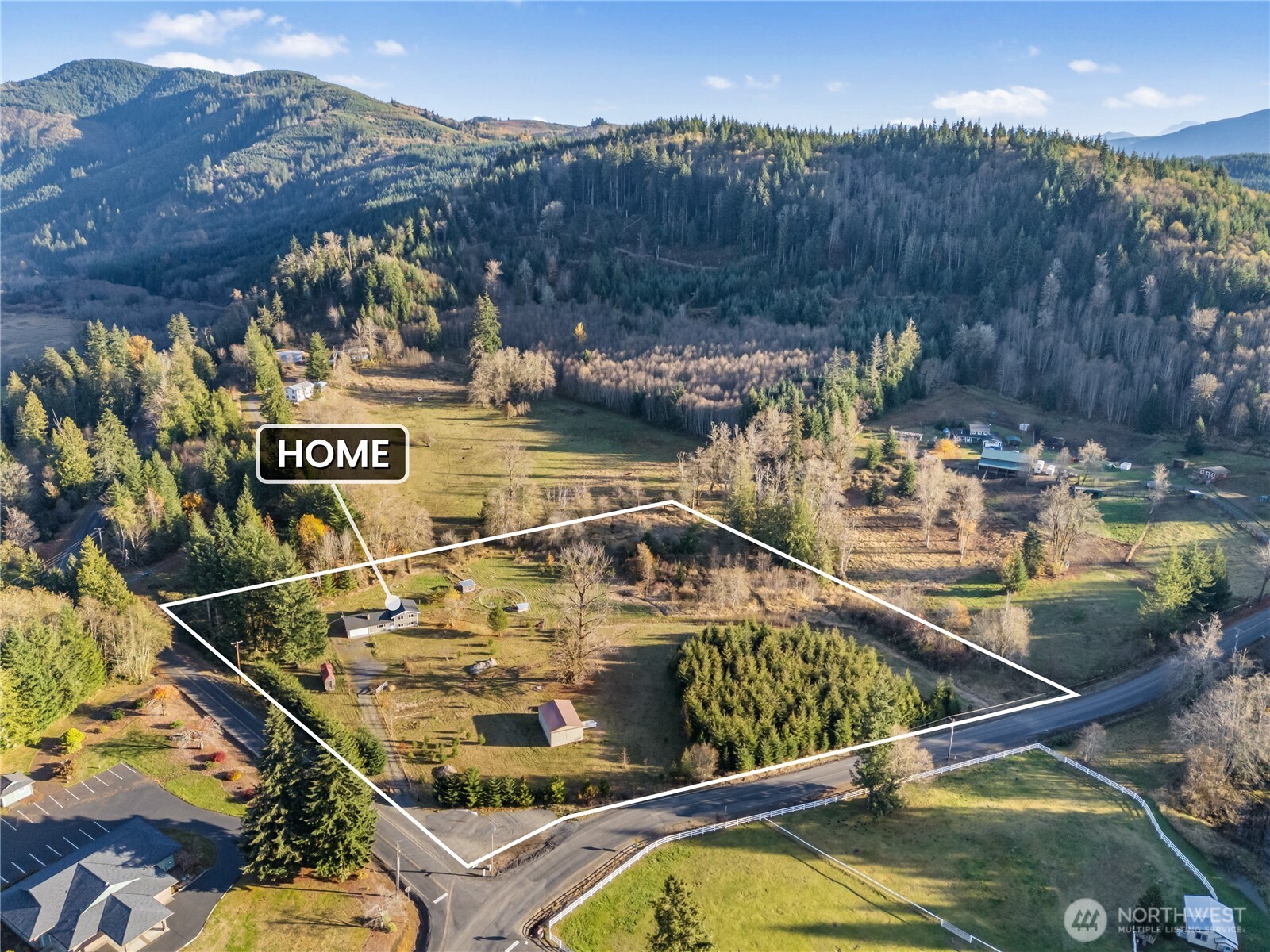 124 Highland Valley Road Morton, WA 98356 - Photo 29 of 36 a view of swimming pool with a yard and mountain view