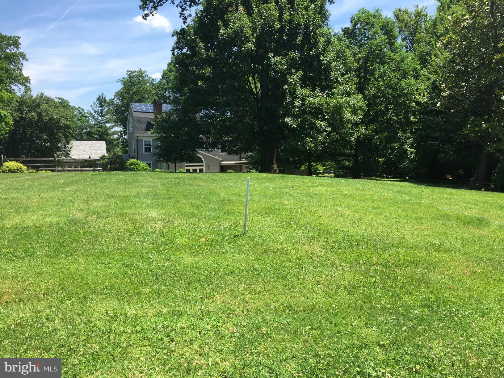 6499 Darnall Road Baltimore, MD 21204 - Photo 7 of 8 a view of a field of grass and trees