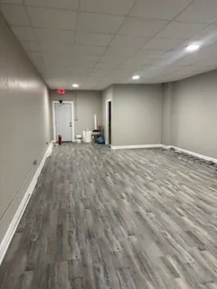 a view of a big room with wooden floor