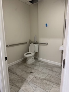 34 North Genesee Street Waukegan, IL 60085 - Photo 12 of 15 a bathroom with a toilet and a shower
