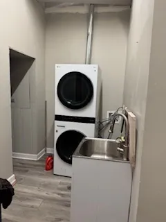 a view of livingroom with washer and dryer