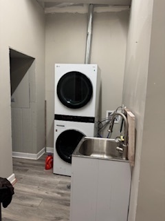 34 North Genesee Street Waukegan, IL 60085 - Photo 5 of 15 a view of livingroom with washer and dryer