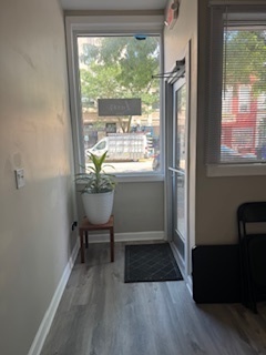 34 North Genesee Street Waukegan, IL 60085 - Photo 7 of 15 a workspace with wooden floor and a window