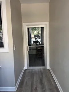 a view of an empty room and window