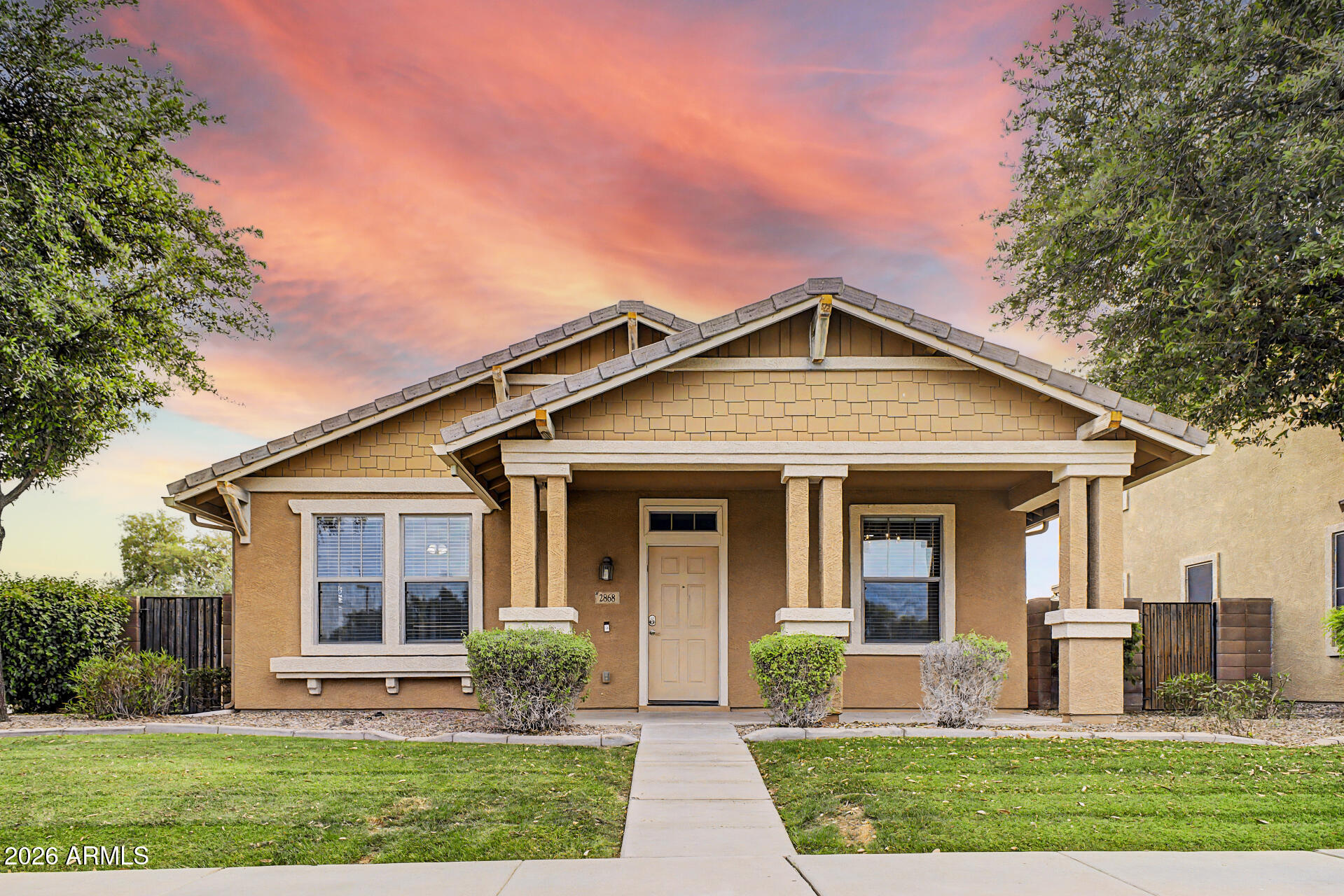 2868 South Anderson Lane Gilbert, AZ 85295 - Photo 1 of 59 a front view of a house with garden