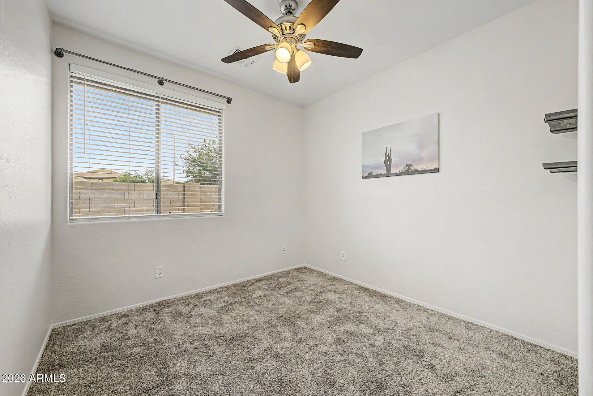 2868 South Anderson Lane Gilbert, AZ 85295 - Photo 24 of 59 a view of a bedroom with a window