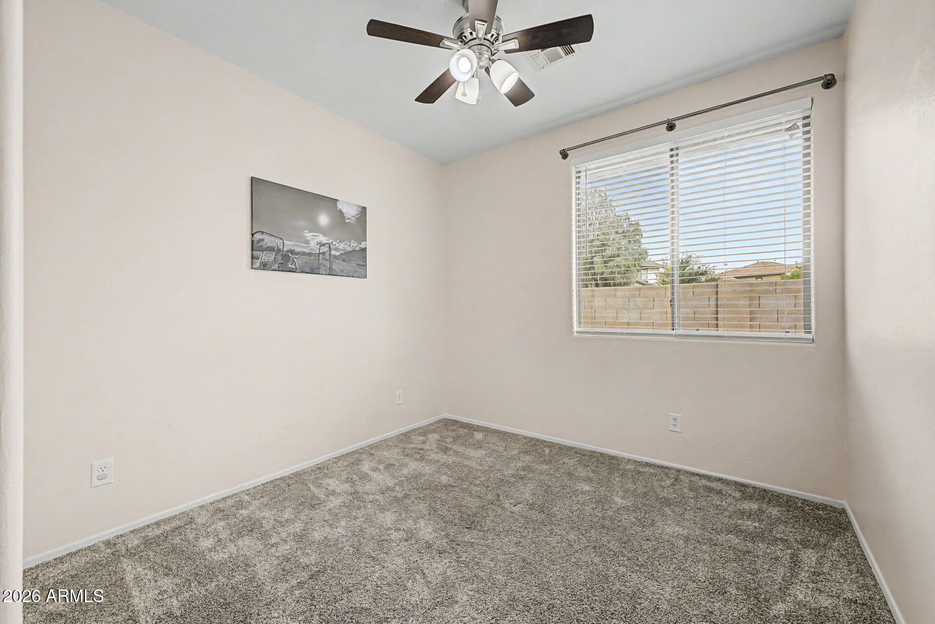 2868 South Anderson Lane Gilbert, AZ 85295 - Photo 27 of 59 a view of a livingroom with a ceiling fan and window