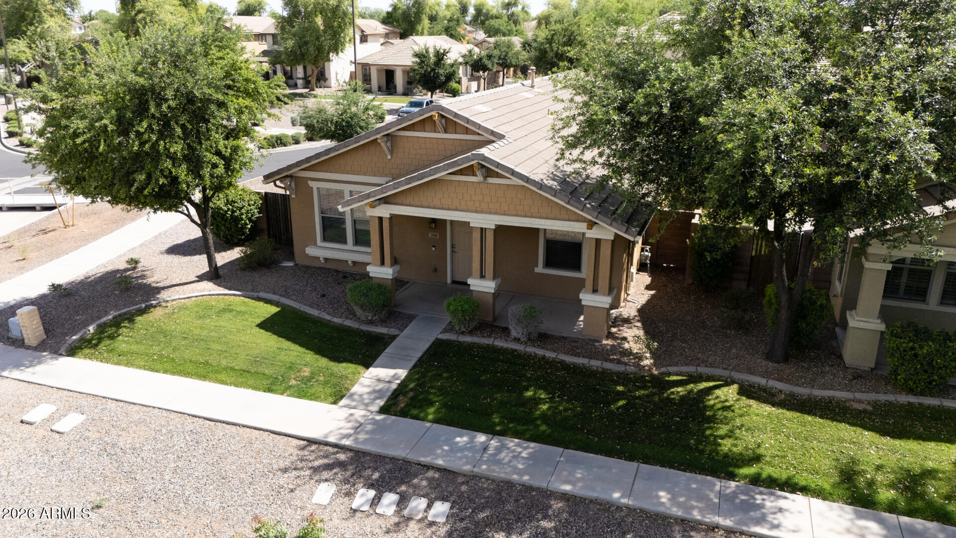 2868 South Anderson Lane Gilbert, AZ 85295 - Photo 44 of 59 a front view of a house with a yard