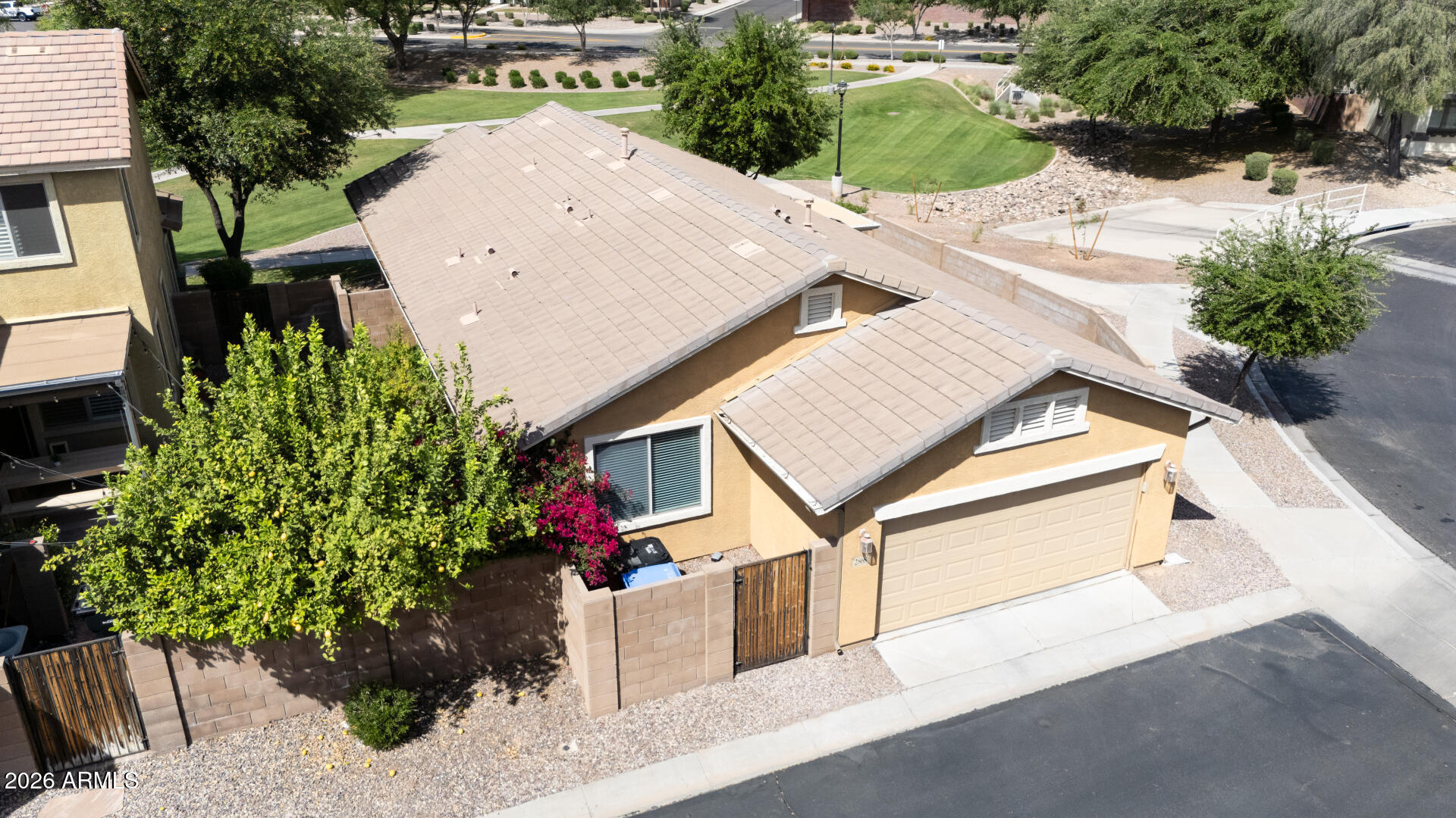 2868 South Anderson Lane Gilbert, AZ 85295 - Photo 5 of 59 an aerial view of a house with a yard and potted plants