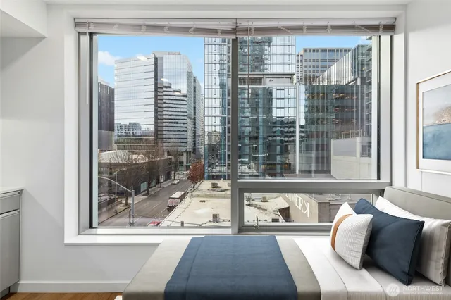 a view of a living room and a large window