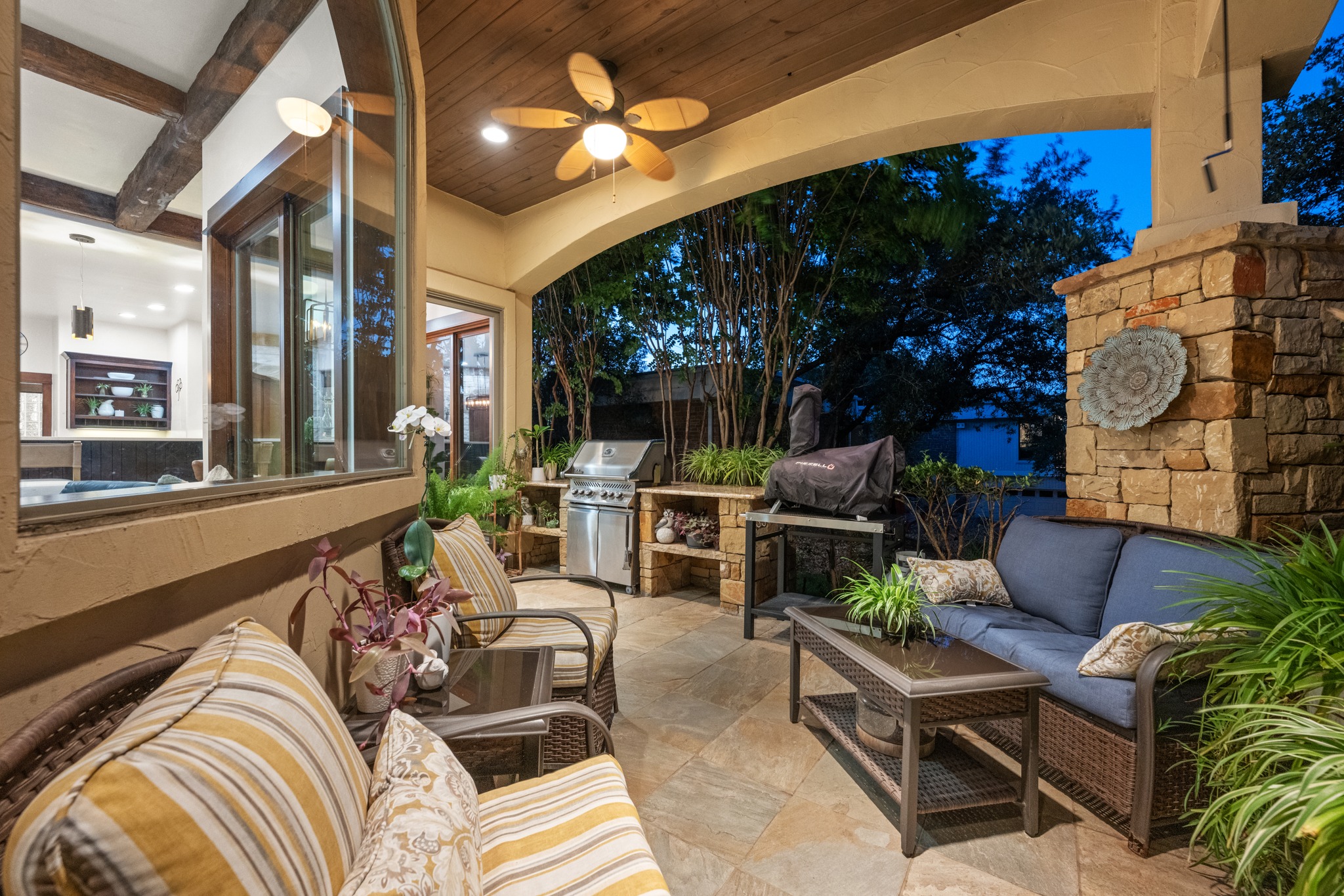 407 Hurst Creek Road Lakeway, TX 78734 - Photo 13 of 40 Step right outside of the kitchen to the OUTDOOR GRILL and another covered living space.
