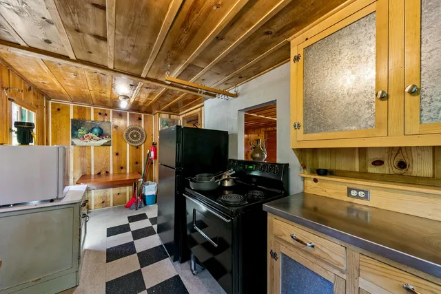 a bed room with wooden floor