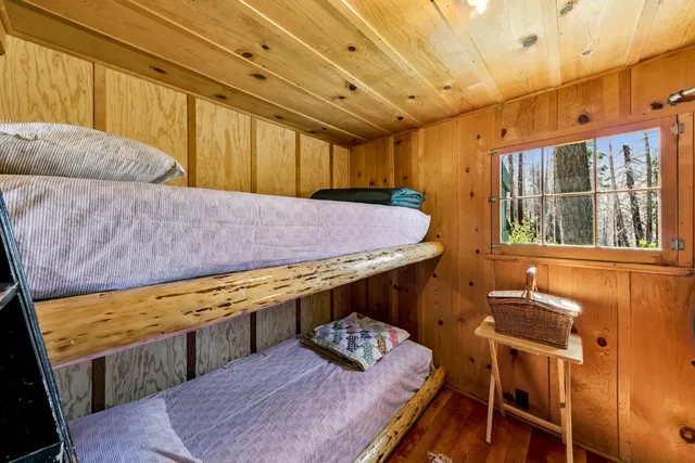a bathroom with a toilet a sink and a shower
