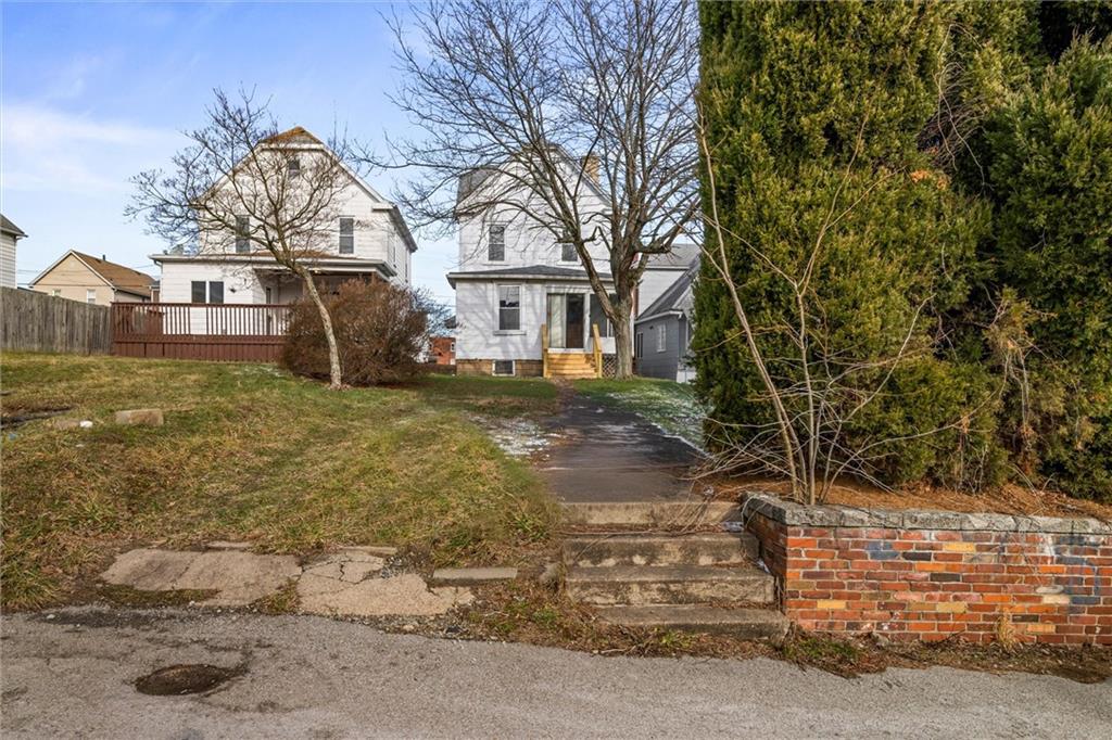 325 Walnut Street Vandergrift, PA 15690 - Photo 28 of 29 a view of a house with a yard